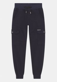 Námořnické cargo kalhoty s elastickým pasem, nastavovacím šňůrkou a několika kapsami. Obsahují jemné šití a tapered střih.