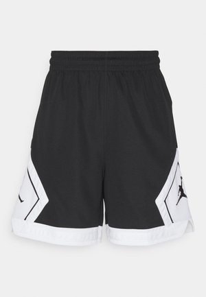 Sorte sports shorts lavet af åndbart stof, med hvide detaljer og et sort logo på siden, samt en elastisk talje for komfort.