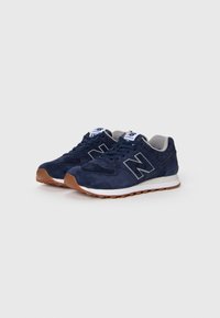 New Balance ML574 UNISEX Trainers pigment/dark blue Zalando