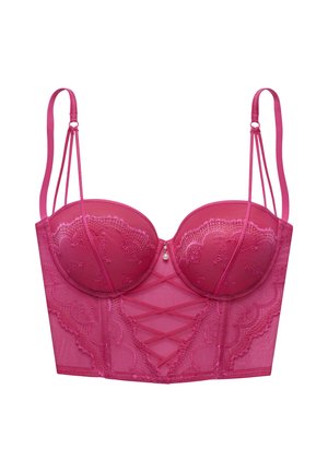 Pink lace bustier bra with underwire cups, crisscross ribbon details, double thin shoulder straps, and a small pearl charm at center.