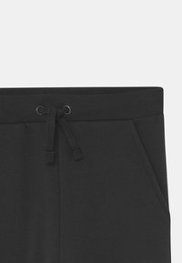 Marks & Spencer JOGGER - Jogginghose - black