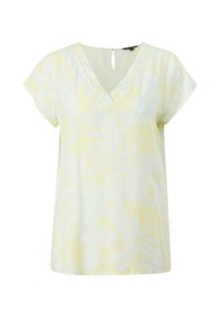 Blouse jaune pâle à manches courtes avec col en V, motif discret de feuilles tropicales blanches et fermeture au dos par bouton œillet.