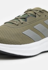 adidas Performance GALAXY  - Road running shoes - olive strata/iron metallic/core black