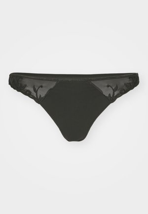 Zwarte stringonderbroek met doorschijnende meshpanelen en geborduurde bloemenaccenten aan de zijkanten, die een mix van materialen en texturen biedt.