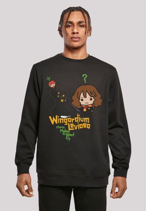 Black sweatshirt featuring cartoon graphics of a wand, characters, and text: "Wingardium Leviosa, charm: Makes an object fly."