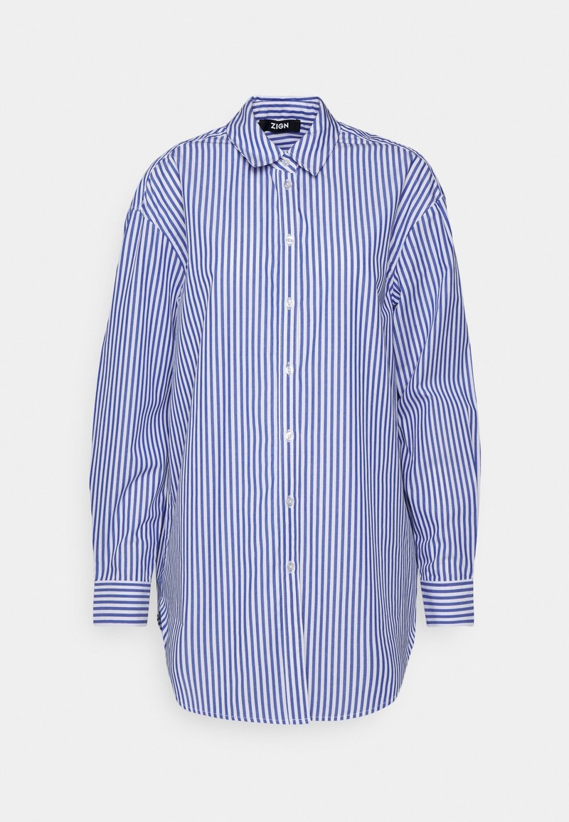 Camicia button-up a righe blu e bianche con colletto, maniche lunghe e pattina con bottoni. Presenta una vestibilità comoda e un tessuto testurizzato.