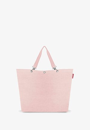 Roze canvas tote bag met een gestructureerde vorm, korte stoffen handvatten en metalen hardware accenten op de bevestigingspunten.