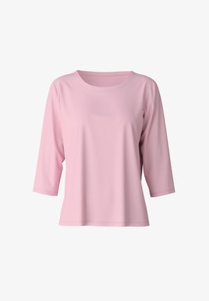 Lichtroze shirt met ¾ mouwen, gemaakt van zacht, glad weefsel, met een ronde halslijn en een ontspannen pasvorm. Heeft geen patronen of accenten.