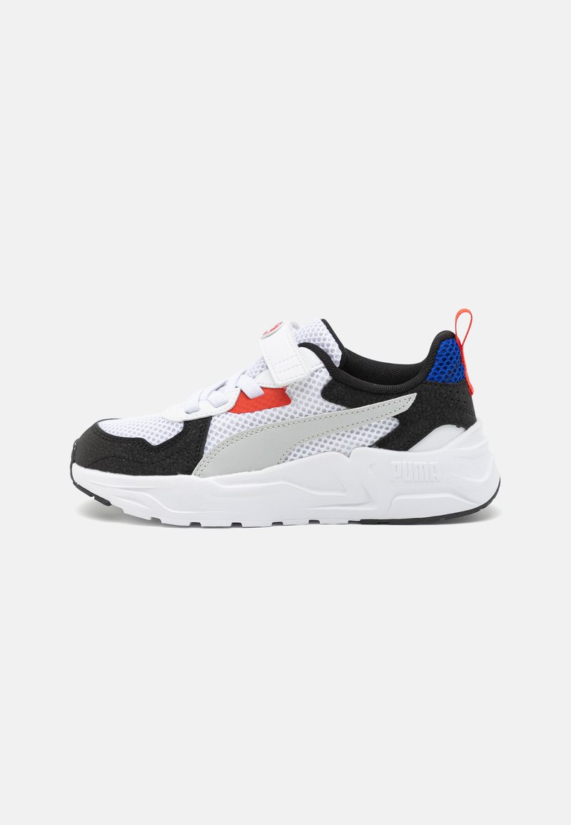 Black, white, and grey sneaker with mesh upper, red and blue accents, padded collar, and textured sole. Features a pull tab for easy wear.