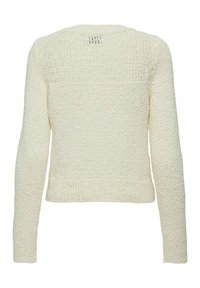 Pull en maille beige clair avec des manches longues, un motif texturé, des poignets côtelés et une coupe courte. Pas de fermetures ni de décorations visibles.