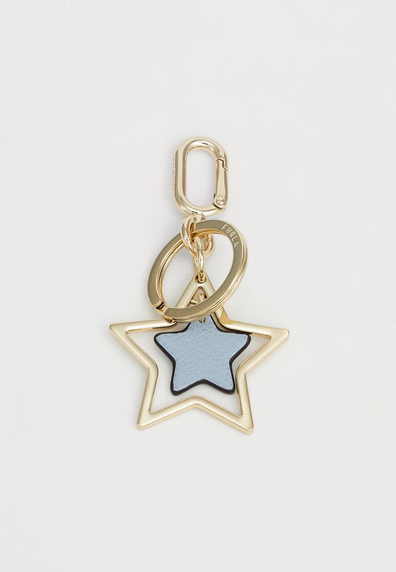 Chaveiro em metal dourado com contorno de estrela e inserção em couro azul. Inclui dois anéis circulares para fixação.