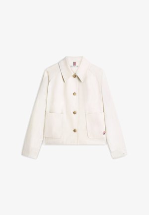 Off-White Hemdjacke mit großen Fronttaschen, spitzem Kragen und dezent besticktem Logo auf der unteren rechten Tasche.