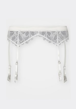 Ceinture en dentelle blanche avec un motif de feuilles et un bord festonné, dotée de quatre bretelles en satin ajustables avec clips. Design en maille texturée.
