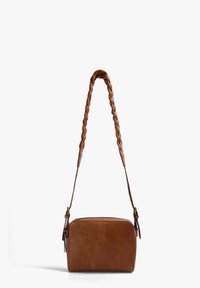 Brown leather crossbody bag with a braided strap, zip closure, rectangular shape, and a smooth texture. Features side tassel detail.