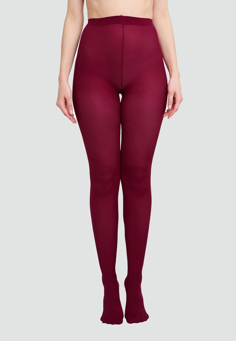 Collant opachi bordeaux con vita alta e design senza cuciture, caratterizzati da una texture liscia e uno stile con piede per un look aderente.