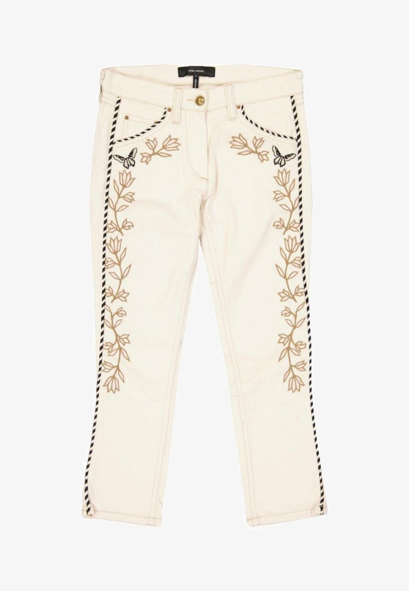 Pantalon couleur crème avec broderie florale verticale et motifs de papillons à l'avant, avec un biais rayé noir et blanc sur les côtés.