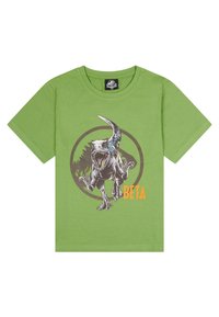 Camiseta de algodón verde con un estampado gráfico de un dinosaurio y la palabra "BETA" en naranja, en un diseño circular marrón.