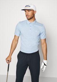 TravisMathew THE ZINNA - Pólóing - heather light blue