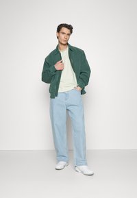 Carhartt WIP BRANDON PANT - Vaqueros baggy - blue