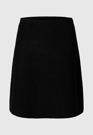 Gonna nera a maglia con vita aderente; forma a trapezio; texture liscia; orlo che arriva a metà coscia, senza motivi visibili o decorazioni.