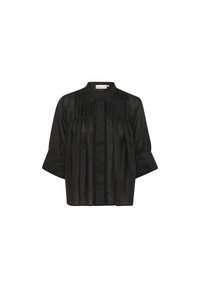 Blouse en lin noir avec col mandarin, présentant des plis verticaux et une fermeture à boutons. Manches trois-quarts de coupe ample.