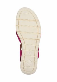 Sandalo aperto con tomaia fucsia e suola in gomma beige, caratterizzato da un battistrada testurizzato per una migliore aderenza. Taglia 37 riportata sulla suola.