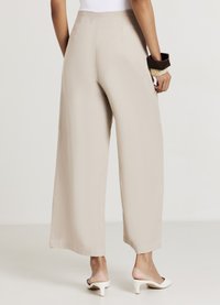 Calliope CULOTTE CON FIBBIA - Pantaloni - sabbia medio