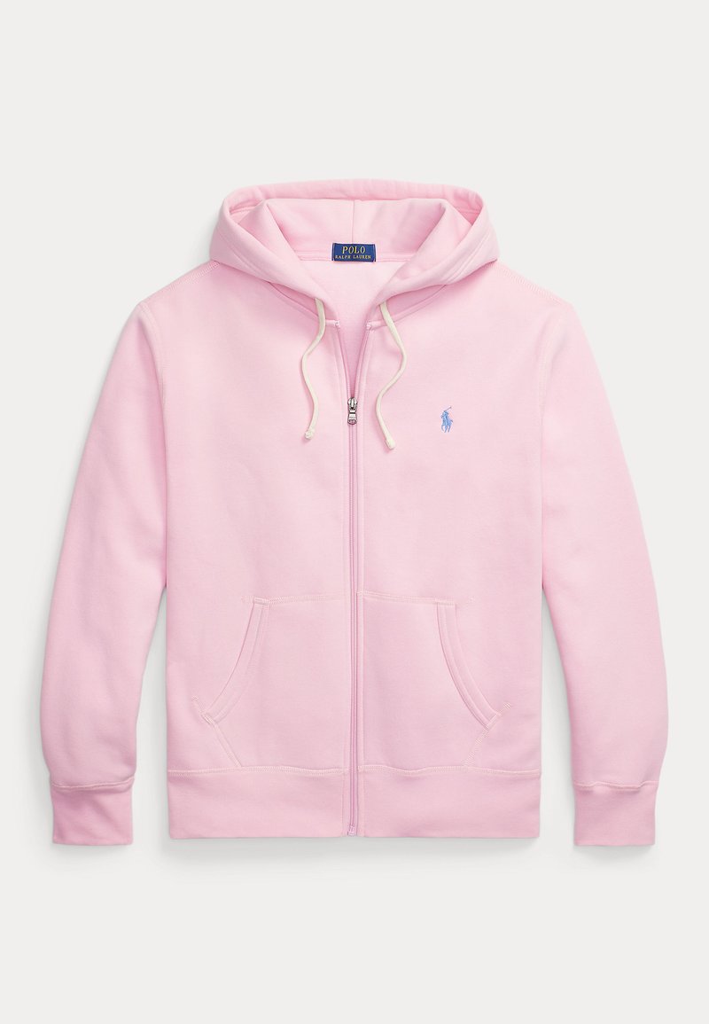 Light pink zip-up hoodie with front pockets, drawstring hood, and small blue embroidered logo on the chest.