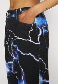 Jaded London LIGHTNING - Calças de ganga de perna direita - blue