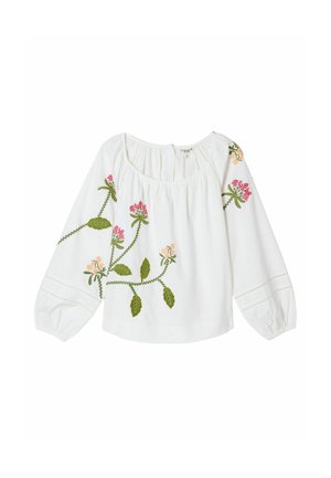 Blouse blanche à manches longues avec un col en forme de scoop et des vignes vertes brodées ainsi que des fleurs roses et pêche sur les manches et l'avant.