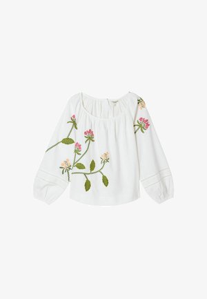 Blouse blanche à manches longues avec un col en forme de scoop et des vignes vertes brodées ainsi que des fleurs roses et pêche sur les manches et l'avant.