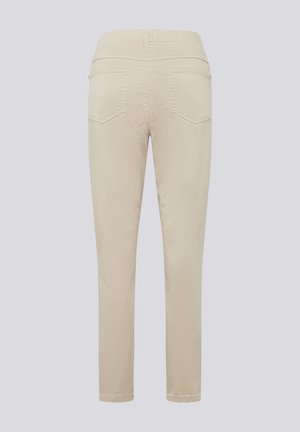 Beige, fitted trousers with a smooth texture. Features two back pockets, stitched detailing, and a comfortable waistband.