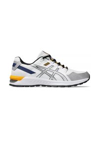 Scarpe da ginnastica bianche con accentuazioni grigie, lacci neri, dettagli gialli e blu, tomaia in rete testurizzata e suola ammortizzata.