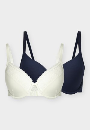 Due reggiseni imbottiti, uno bianco con rifinitura in pizzo e chiusura frontale, uno blu scuro tinta unita, entrambi con spalline regolabili, mostrati su uno sfondo semplice.