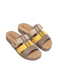 Brown and yellow sandals with a cork sole, featuring a wide strap, gold hardware buckle, and a soft texture. Three horizontal bands across the top.
