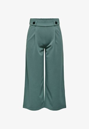 Pantalon à jambes larges et coupe courte en vert discret avec taille haute élastique et boutons noirs décoratifs à l'avant.