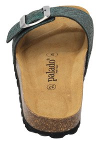 Donkergroene gestructureerde teenslipper met een zilveren verstelbare gesp, kurken voetbed en zwarte rubberen loopzool, gemarkeerd met "palado" en maat 37.
