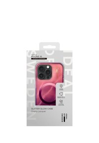 Etui Glitter Glow na iPhone 16, w różowo-fioletowym ombré z okrągłym wzorem. Posiada zgodność z MagSafe oraz wykonane jest z materiałów z recyklingu.