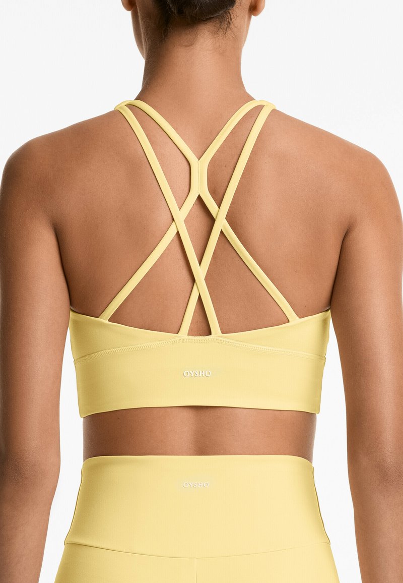 OYSHO STRAPPY BACK - Sport-bh met light support - yellow