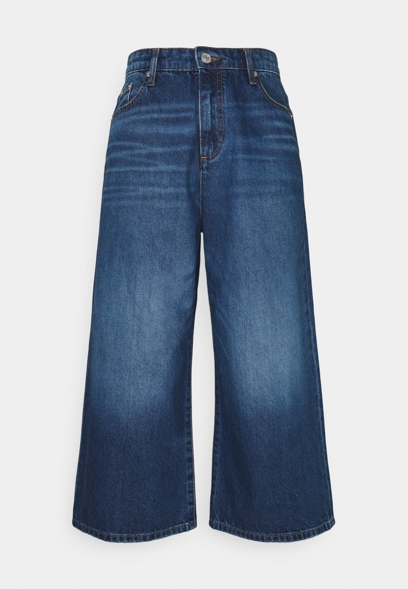 Culottes en denim bleu foncé avec un effet délavé. Dotées d'une taille haute, de jambes larges et d'un design à cinq poches. Ourlet uni, fermeture classique à boutons.