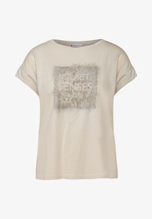 T-shirt beige à manches courtes et coupe décontractée. Présente un graphique texturé avec les mots "QUIET SENSES" en lettres blanches contourées.