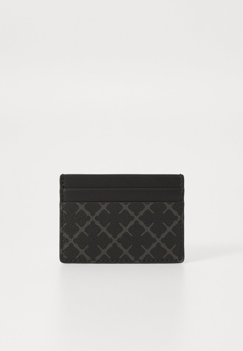 Black card holder made of textured leather, featuring a geometric embossed pattern and smooth accents on the top.