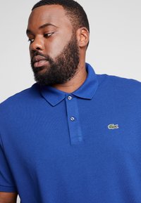 Lacoste Piké - methylene