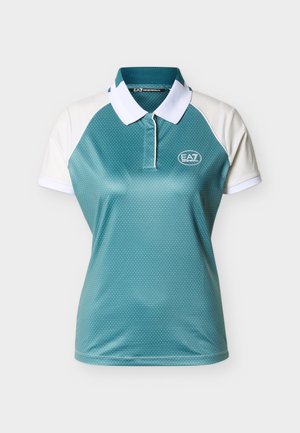 Modré polotričko s bielymi bodkami, bielymi raglánovými rukávmi, bielym golierom a logom EA7 Emporio Armani na hrudi.