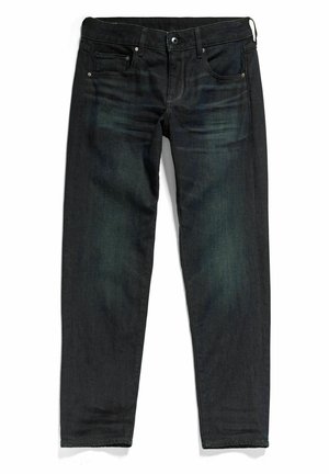 Mørkeblå, slim fit jeans med fem lommer, knappelukning og diskret falmet detaljering på forsiden af lårene.