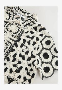 Geselecteerd, black white