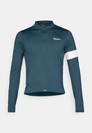 Long-sleeve cycling jersey in teal fabric with a zip front, a white accent on the right arm, and Rapha logo on the chest. Smooth texture.