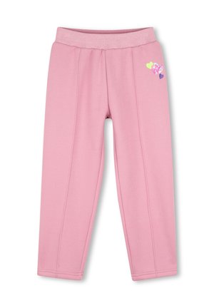Leggings roses pour enfants avec une ceinture côtelée et trois petits motifs en forme de cœur sur la partie supérieure de la jambe gauche.
