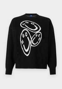 Zwart gebreid sweater met een witte grafisch ontwerp met cirkelvormige figuren en de letters "HGO." Ribgebreide manchetten en onderrand accentueren de structuur.