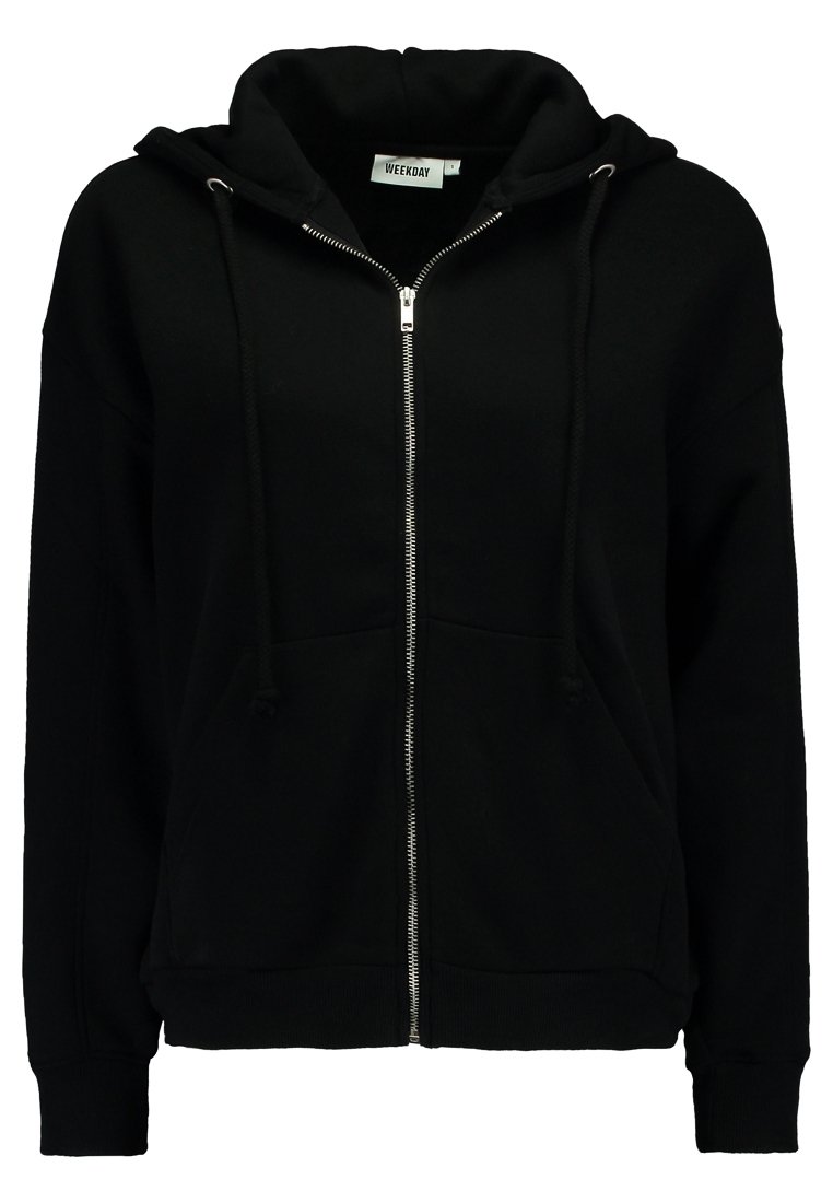 Sweat à capuche noir zippé avec cordon à la capuche et poches avant, en tissu doux, étiqueté Weekday, présenté sur fond blanc.